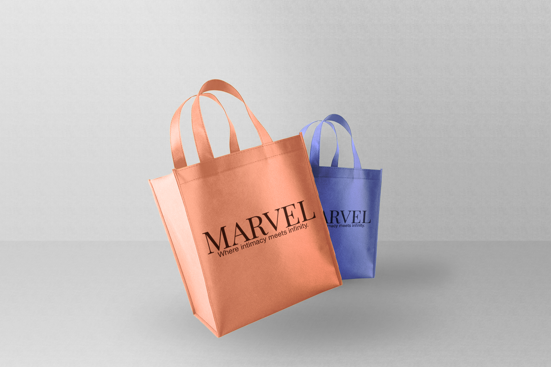 Marvel x A24 tote bag merchandise by Golam Sayon Ahamed — terracotta and slate blue with MARVEL wordmark and Where Intimacy Meets Infinity tagline